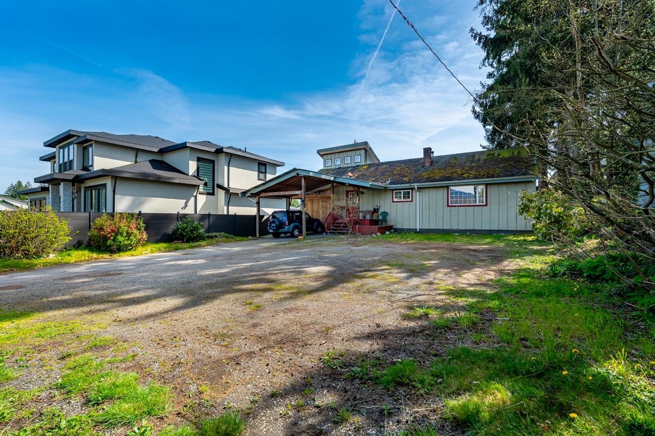 1052 Como Lake Avenue - Central Coquitlam Single Family Residence for Sale, 3 Bedrooms (R2991559) #2