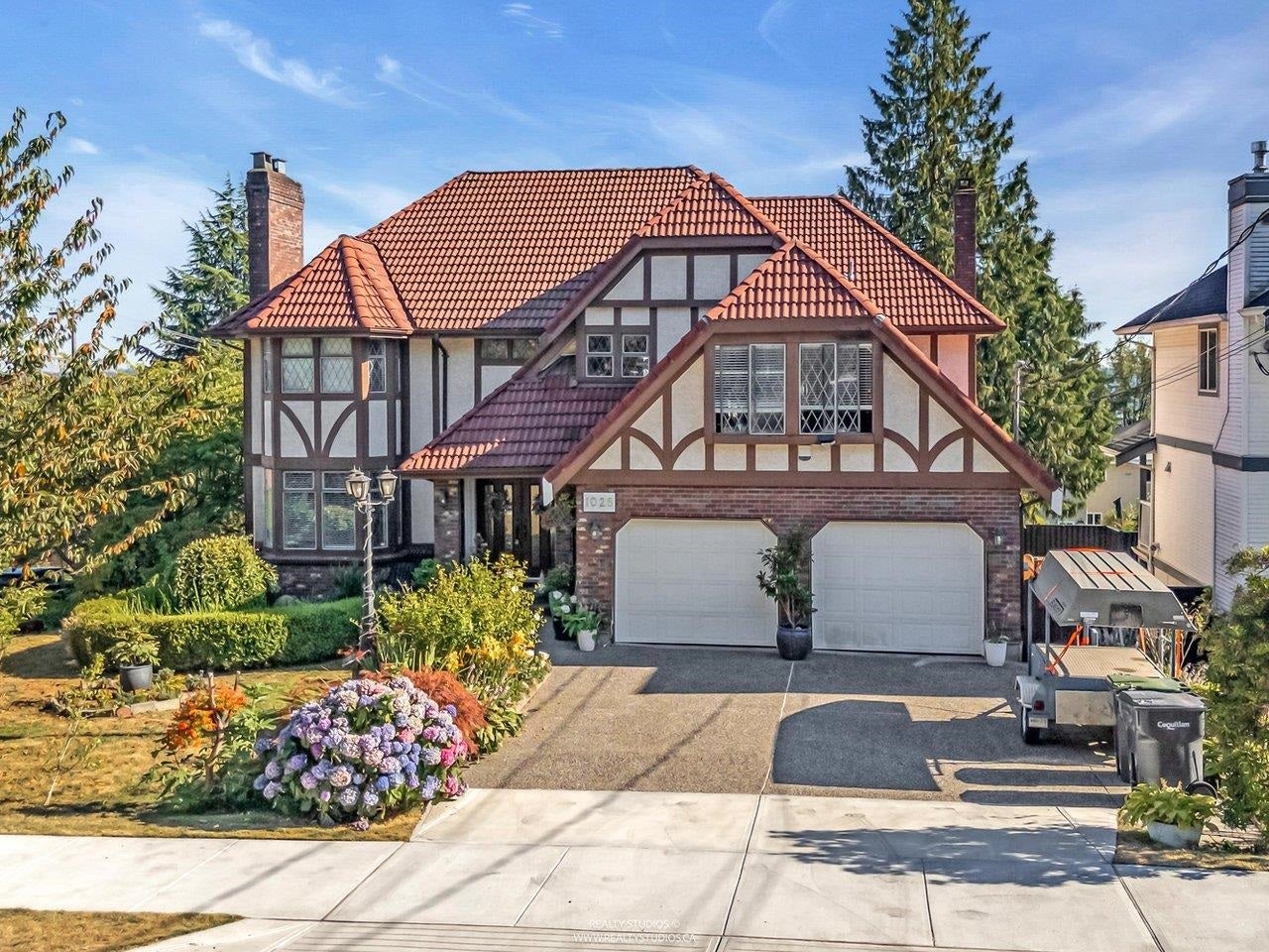 1028 Dansey Avenue - Central Coquitlam Single Family Residence for Sale, 7 Bedrooms (R3033433) #1