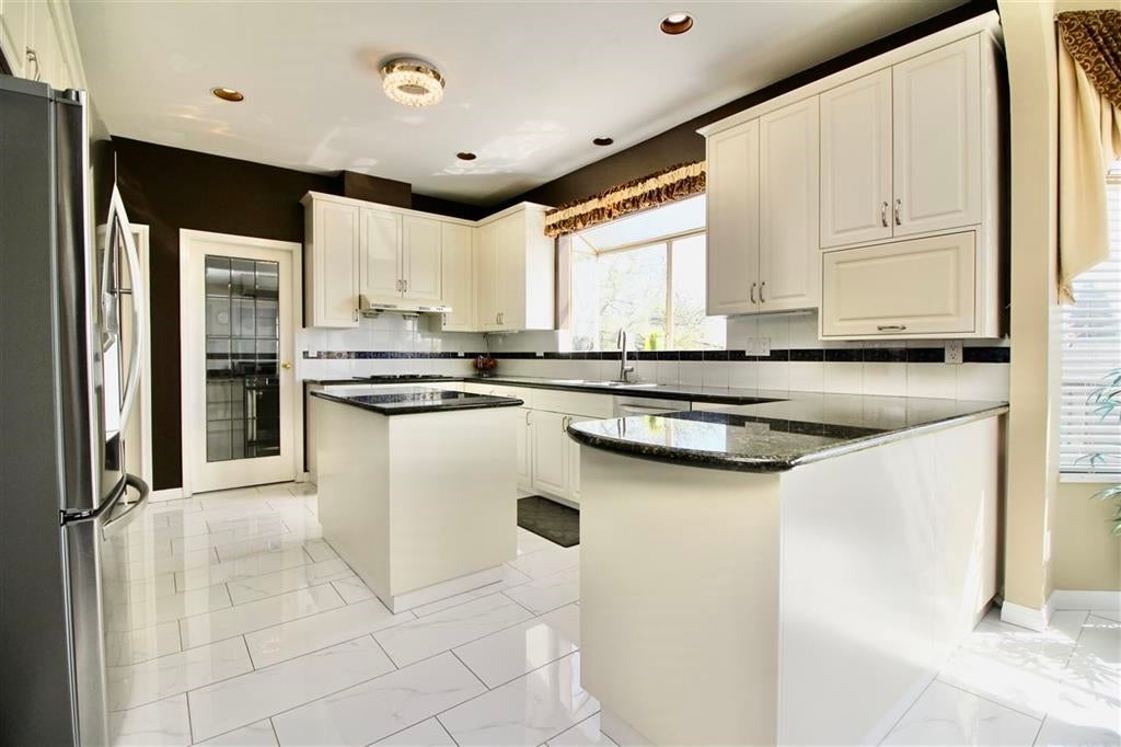 6628 Kitchener Street - Sperling-Duthie Single Family Residence for Sale, 9 Bedrooms (R3071340)# - 5