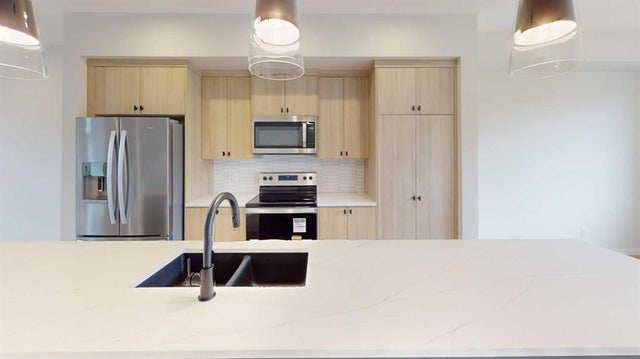 1465 Rangeview Drive SE - Rangeview Semi Detached (Half Duplex) for Sale, 3 Bedrooms (A2243191)