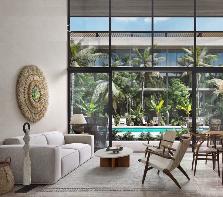 2 Bedroom garden unit with double height ceiling and large windows