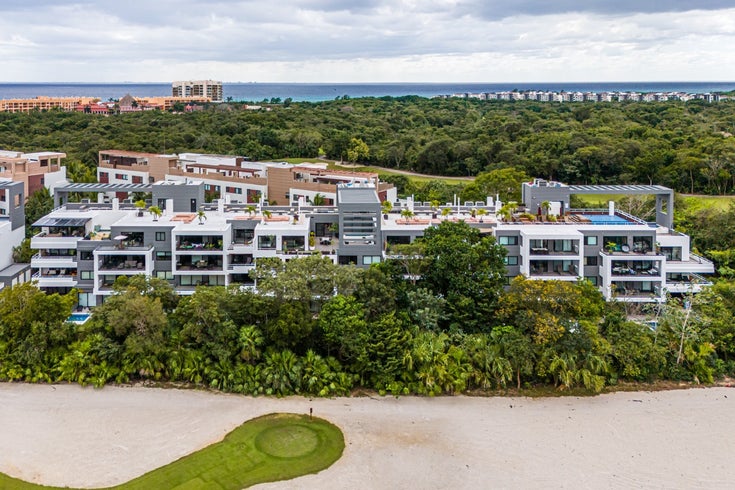 Modern condos with golf course views and beach access 