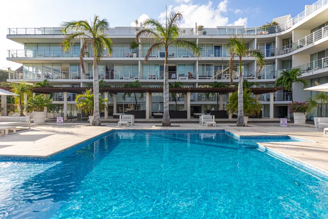 Beachfront Condominium with pool area for family and friends