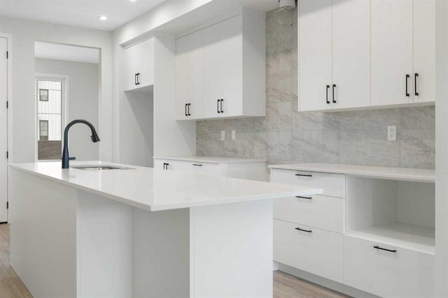 584 Rowmont Boulevard NW - Haskayne Semi Detached (Half Duplex) for Sale, 5 Bedrooms (A2227409)