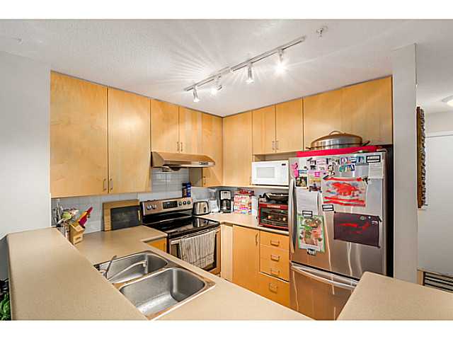 Generous size kitchen with good cupboard space.