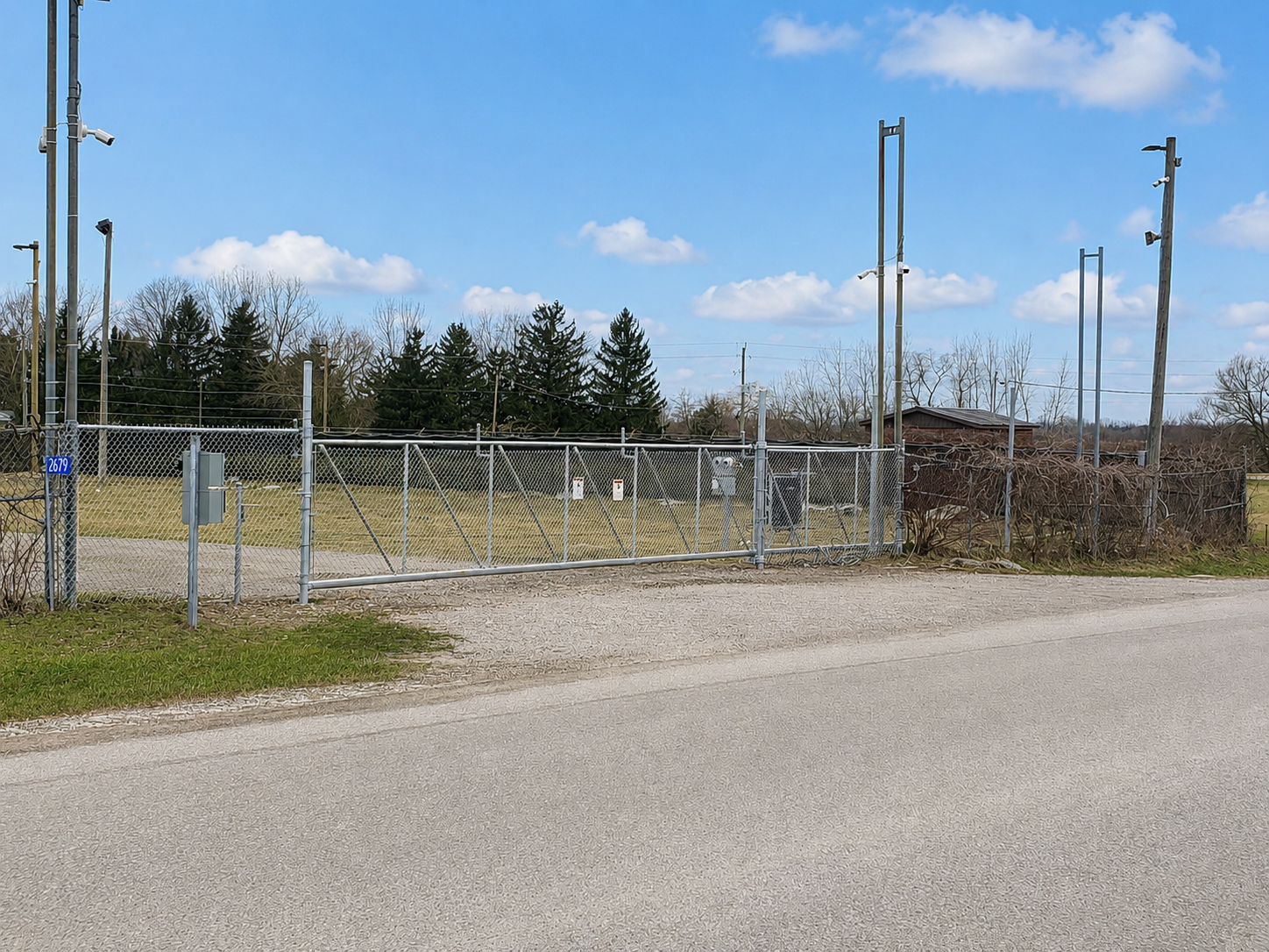 Secure gate entrance at 2679 Couch Road
