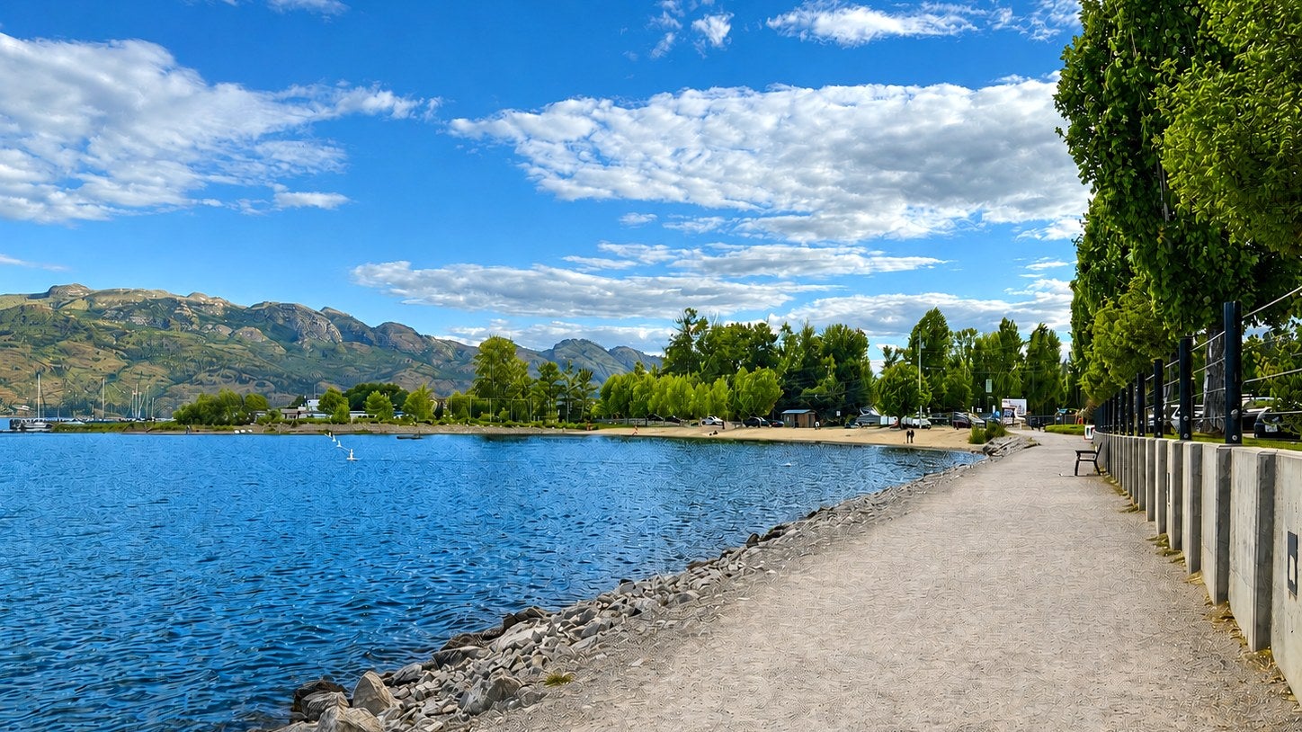 Gellatly Bay waterfront walkway — Okanagan Lake and mountains in the background