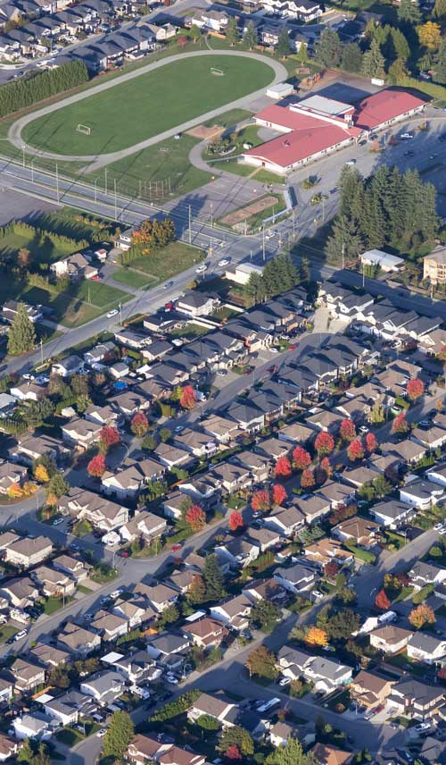 Drone view of Mission Neighbourhood with School