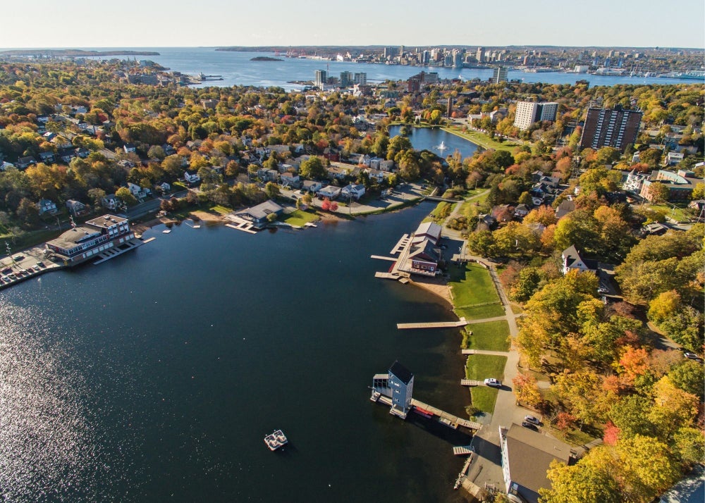 Lake Banook Dartmouth Aerial View with City Skyline Lake Banook in Dartmouth with calm water, rowing facilities, and nearby neighbourhoods leading toward Halifax Harbour