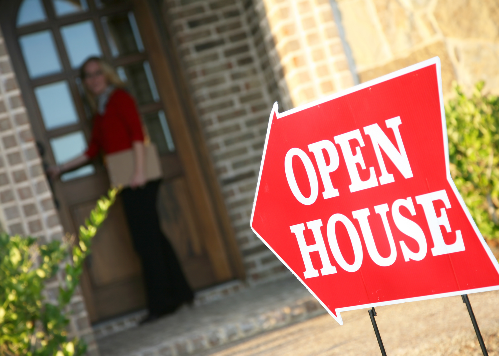 Open House Open house sign in front of home.