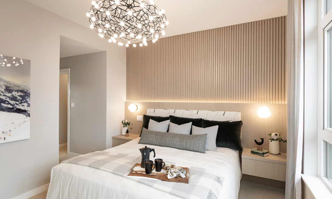 Interior Primary bedroom at Terrain Squamish townhomes featuring natural lighting and modern finishes