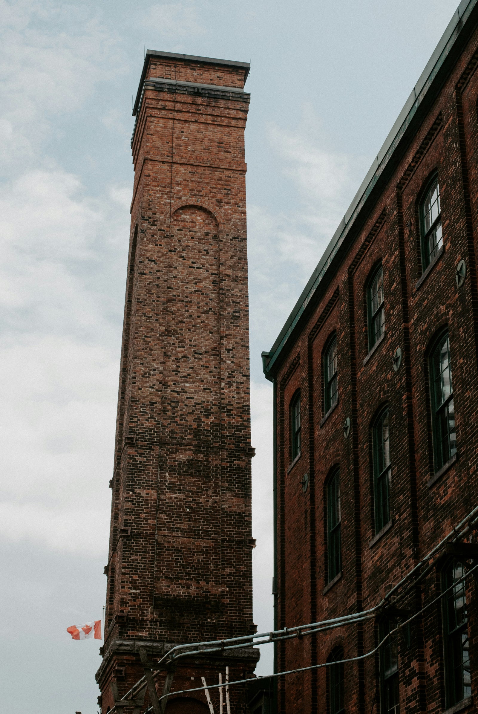 Industrial building photo by Kat Kelley, via Unsplash