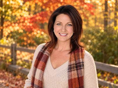 Julie Schmidt Julie Schmidt with fall leaves