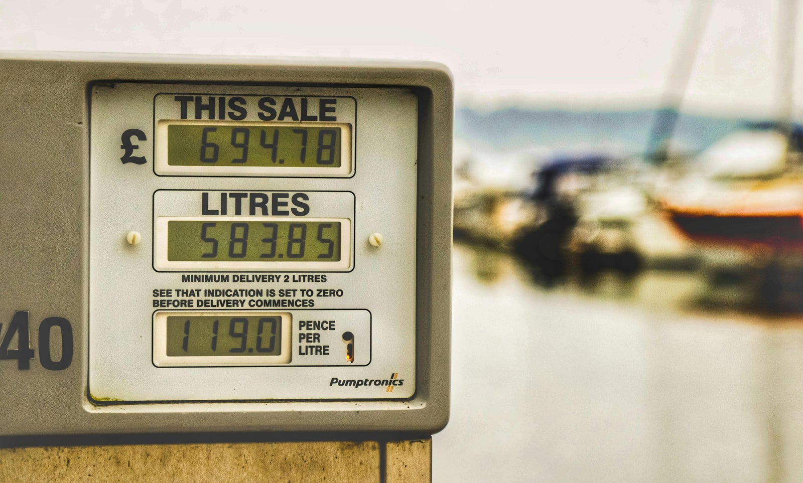Fuel pump price display representing changing prices similar to listing versus selling price in real estate.