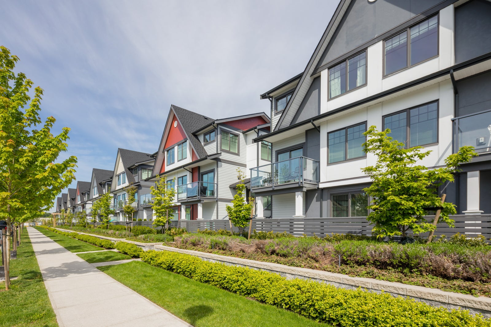 Modern townhomes at Nature’s Walk in Pitt Meadows with landscaped walkways and sidewalks
