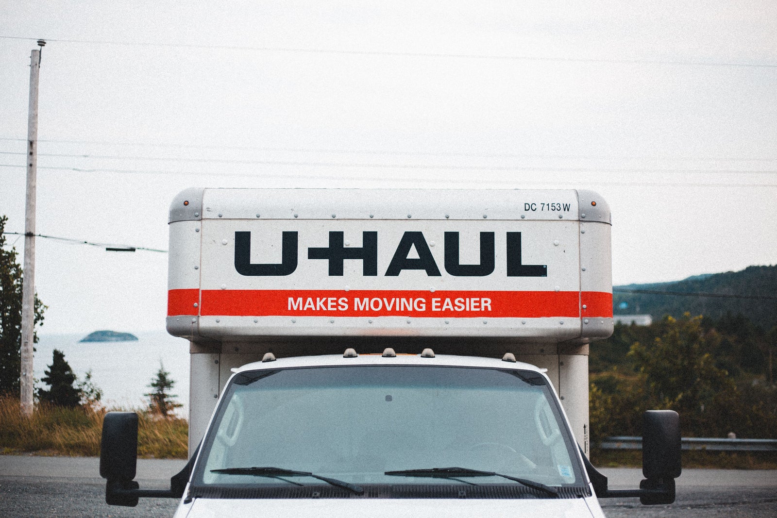 Moving truck parked roadside, illustrating the flexibility and mobility often associated with renting.