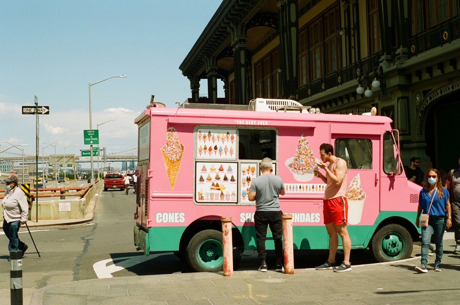 Customers purchasing from an ice cream truck, symbolizing the marketing and buyer attraction involved in selling a home.
