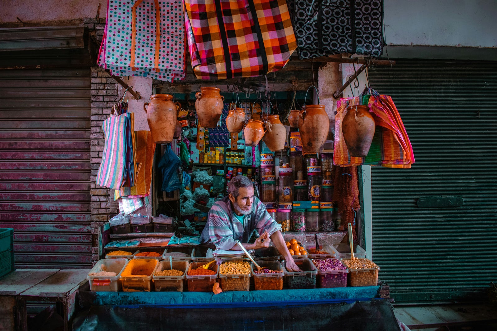 Local market vendor serving customers, representing the importance of presentation and attracting buyers when selling a home.