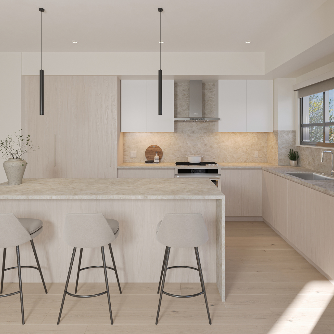 Bright modern kitchen interior in Nature’s Walk townhome in Pitt Meadows with island and open layout