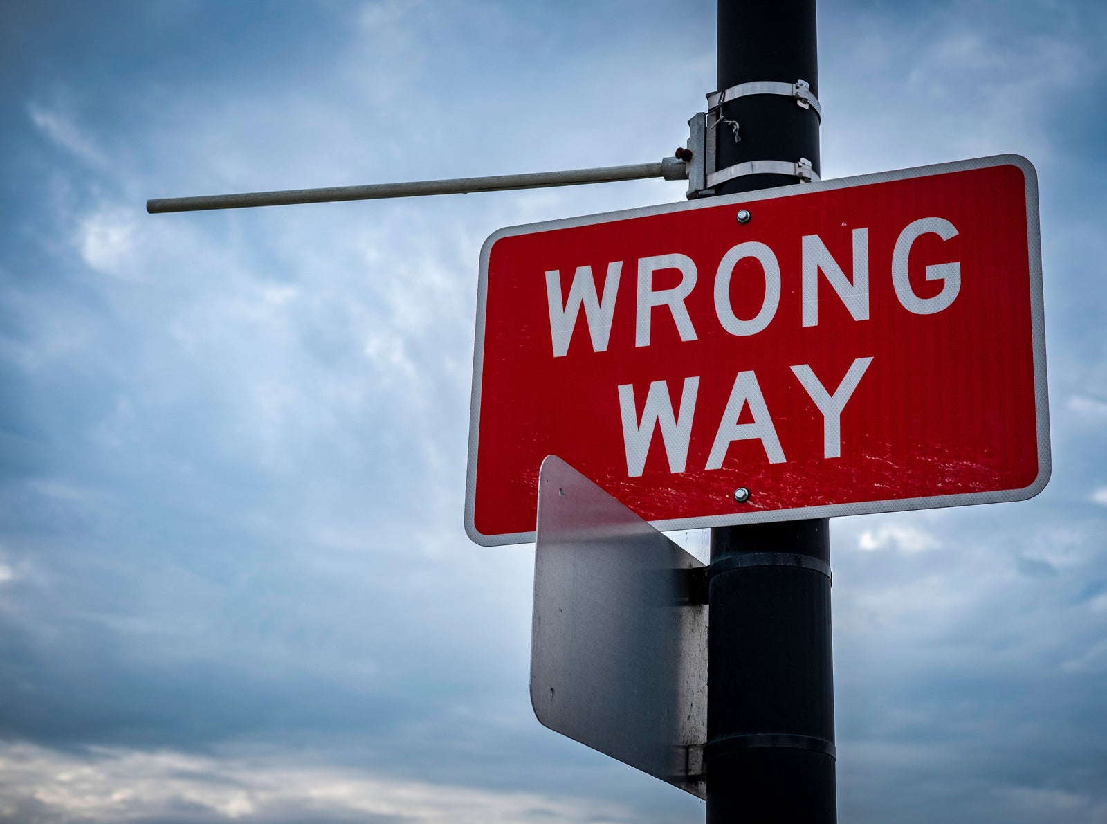 Wrong Way road sign representing common first-time home buyer mistakes that can lead to costly decisions during the home buying process.