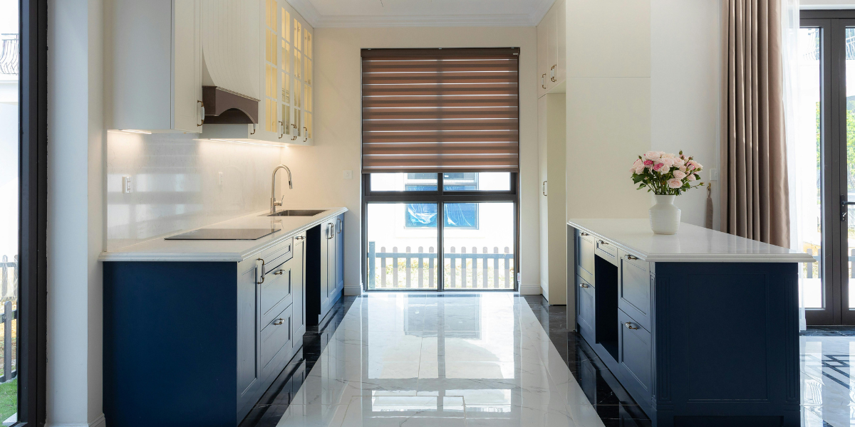 Agent and homeowners greet open house visitors