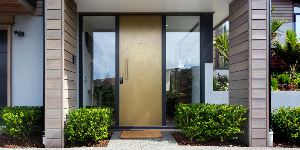 Real estate agent reviews documents with clients