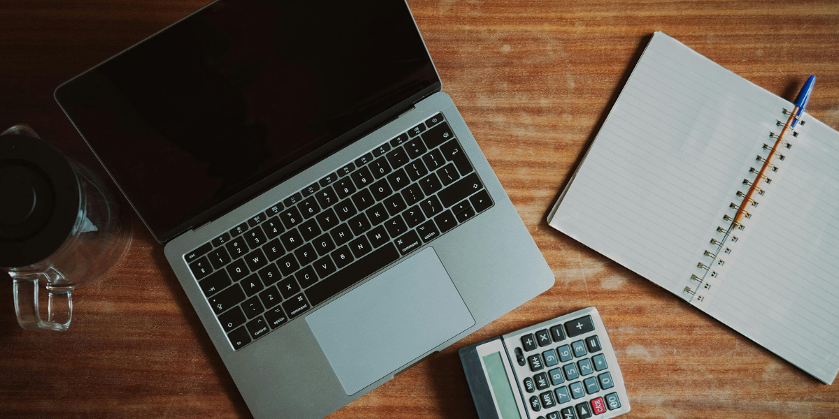 Seller’s agent with homeowners in Durham entryway
