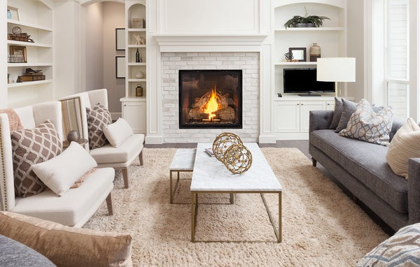Cozy living room staging with fireplace for home selling in Maple Ridge