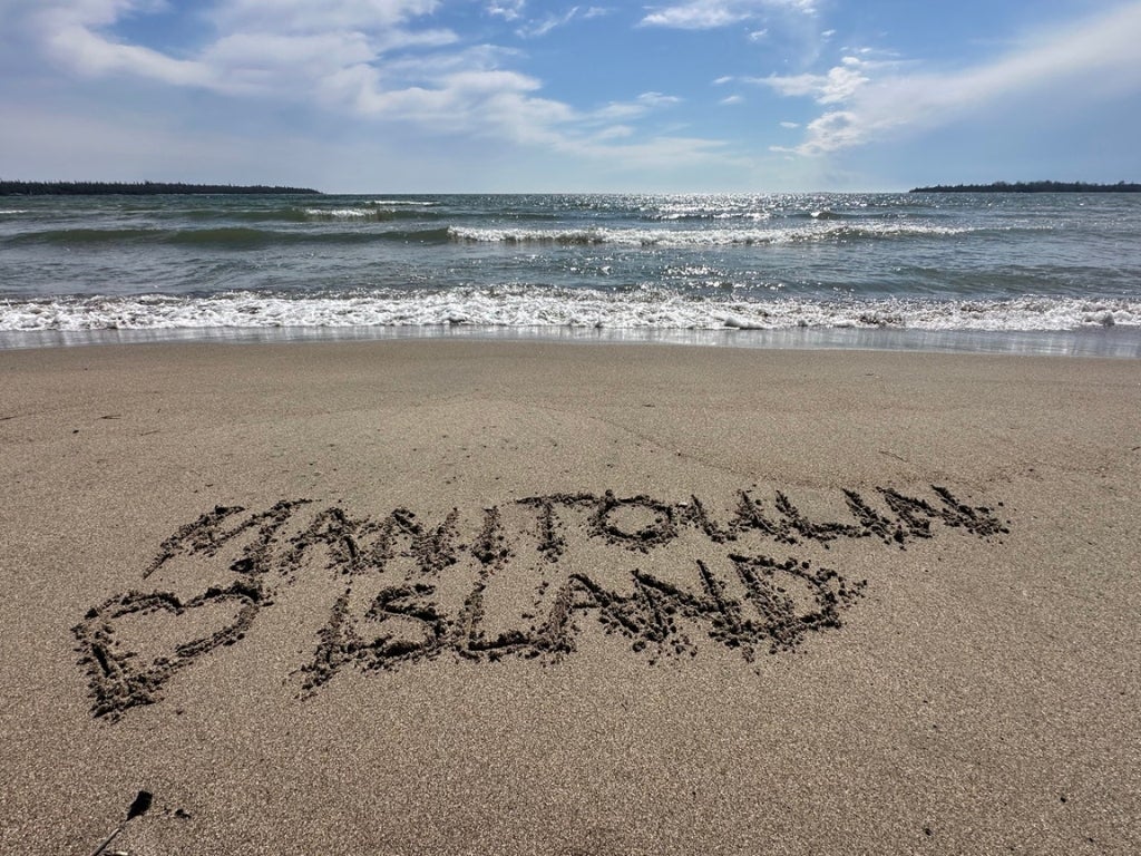 Love Manitoulin Island written in the sand on Providence Bay beach, Manitoulin Island