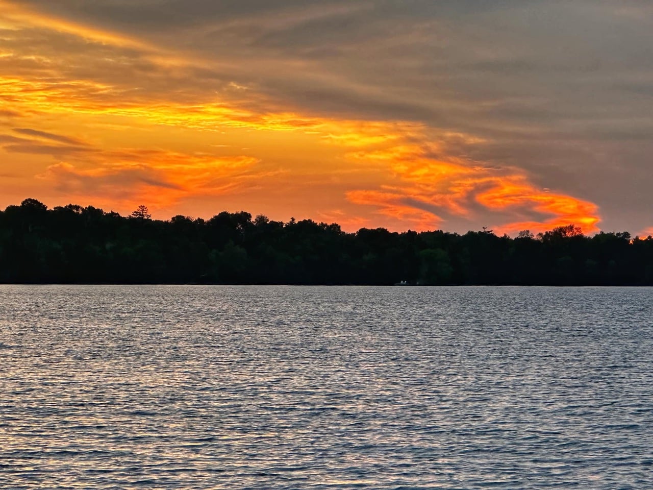 Stunning sunrise showing a loon shape in the sky on Manitoulin Island