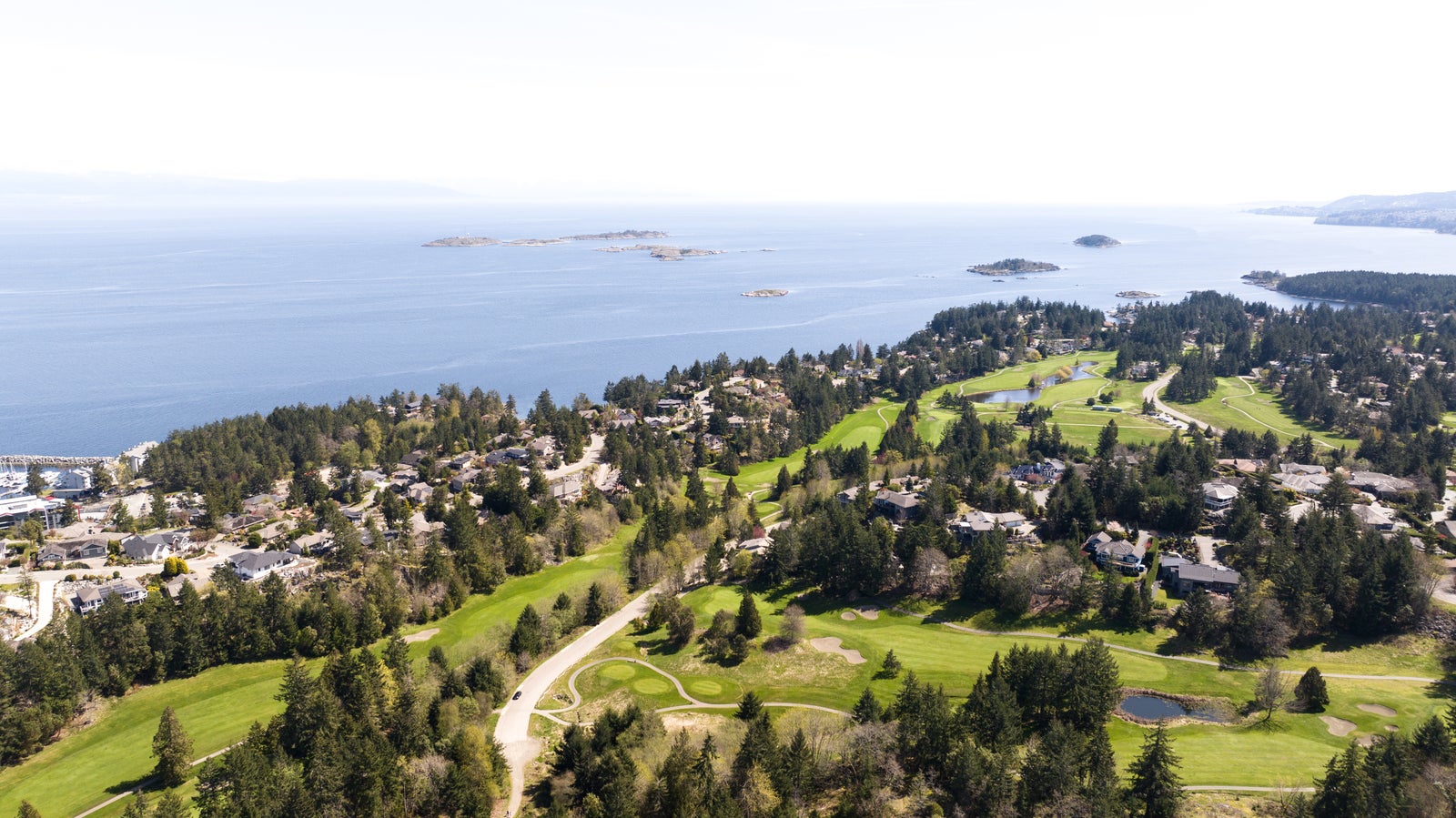 Aerial view of a coastal residential and golf community on Central Vancouver Island