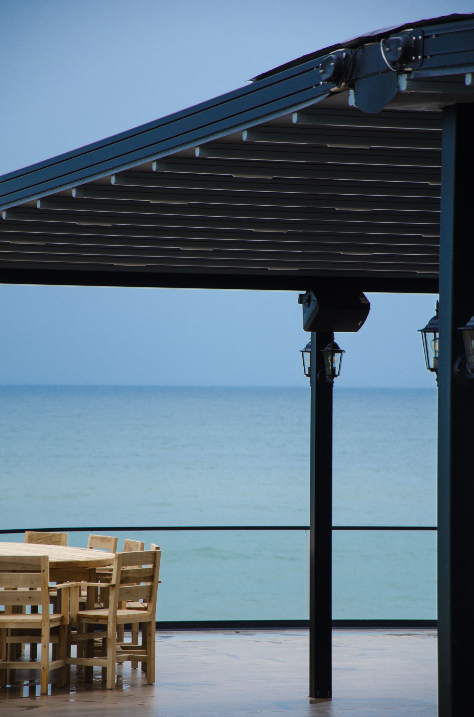 Oceanfront terrace overlooking the water, representing luxury coastal living on Vancouver Island