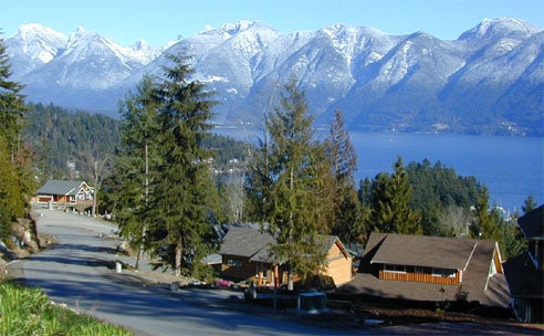 View from Cates Hills across ocean to snow capped mountains