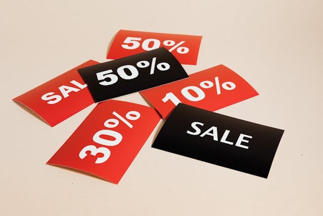 Red and black discount and sales cards.