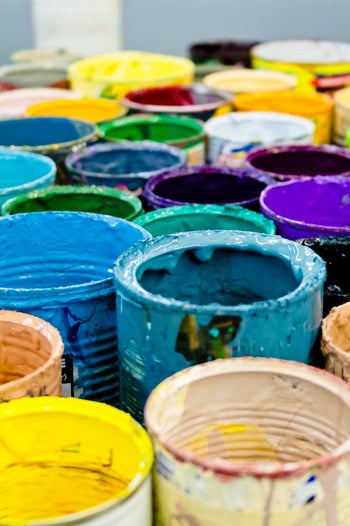 Paint cans all together with different colors paint can pick up 