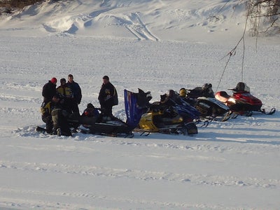 Snowmobiles on Thames River