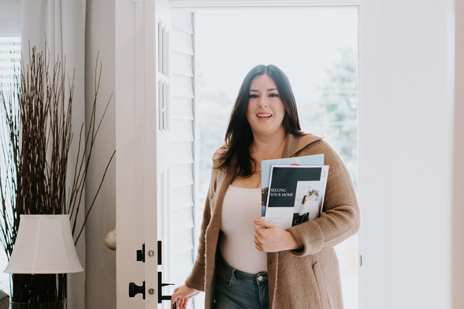 Aliese Mackenzie walking through front door for listing presentation in Sechelt, BC