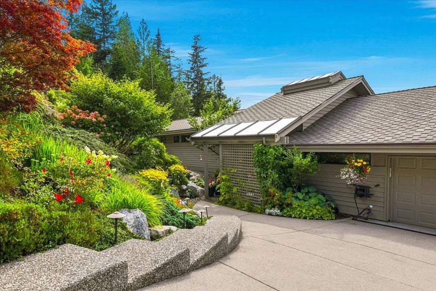 Tour 108 Furry Creek Drive: an architect-designed West Coast contemporary with panoramic Howe Sound views in the Furry Creek golf community.