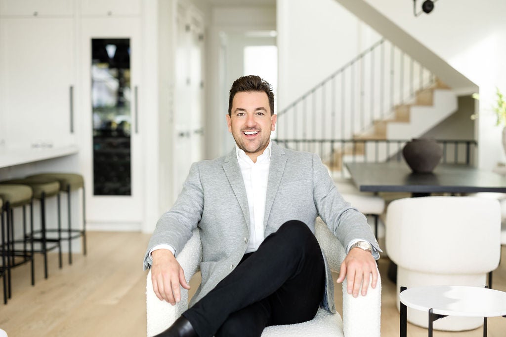 Realtor sitting in a Grand Boulevard House, North Vancouver