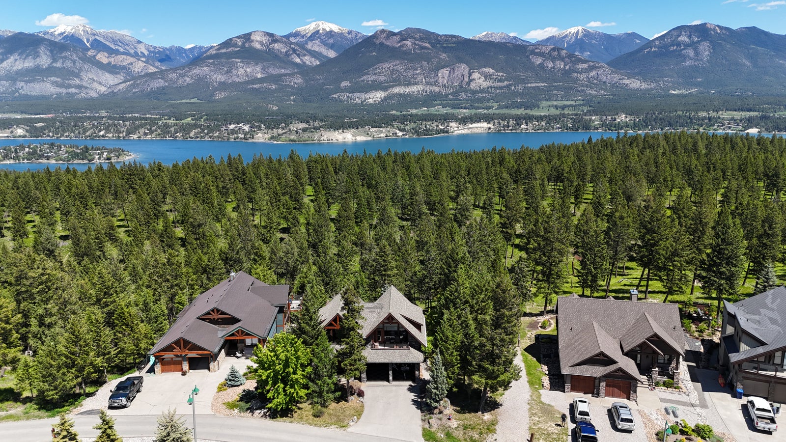 Castlerock homes on the hillside above Invermere, BC with Lake Windermere below