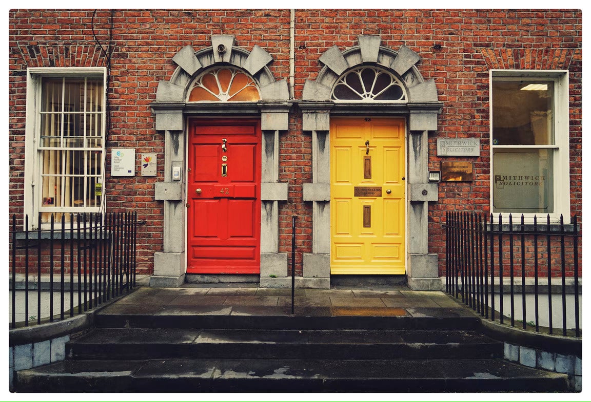 red and yellow door on row houses