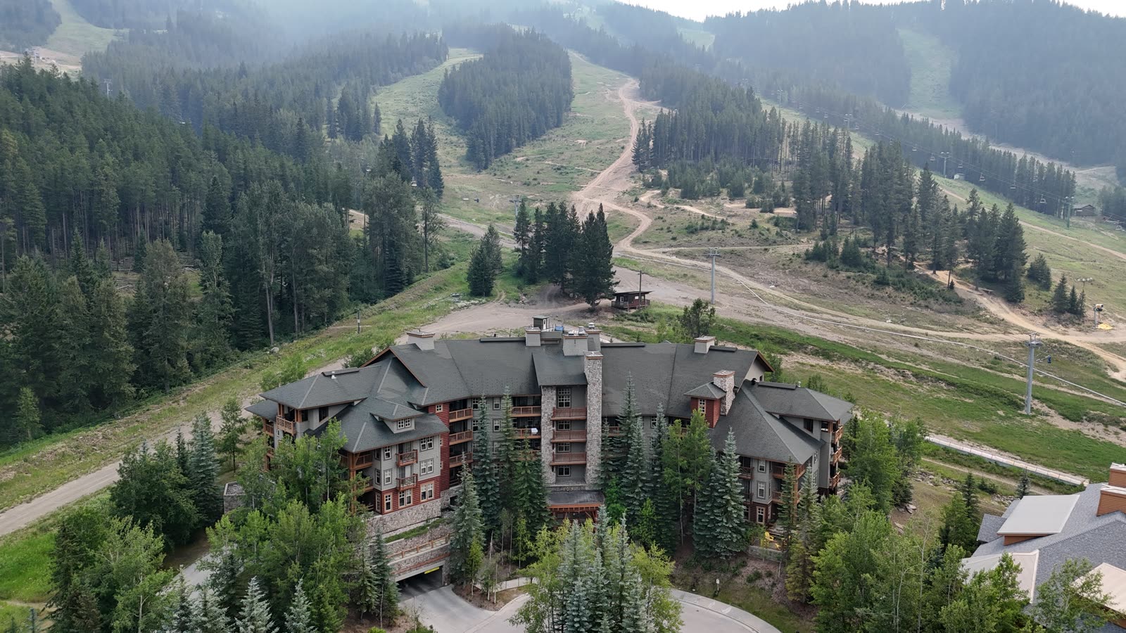 Aerial view of resort-zoned condos and townhomes at Panorama Mountain Resort near Invermere, BC, where lenders typically require 35% down