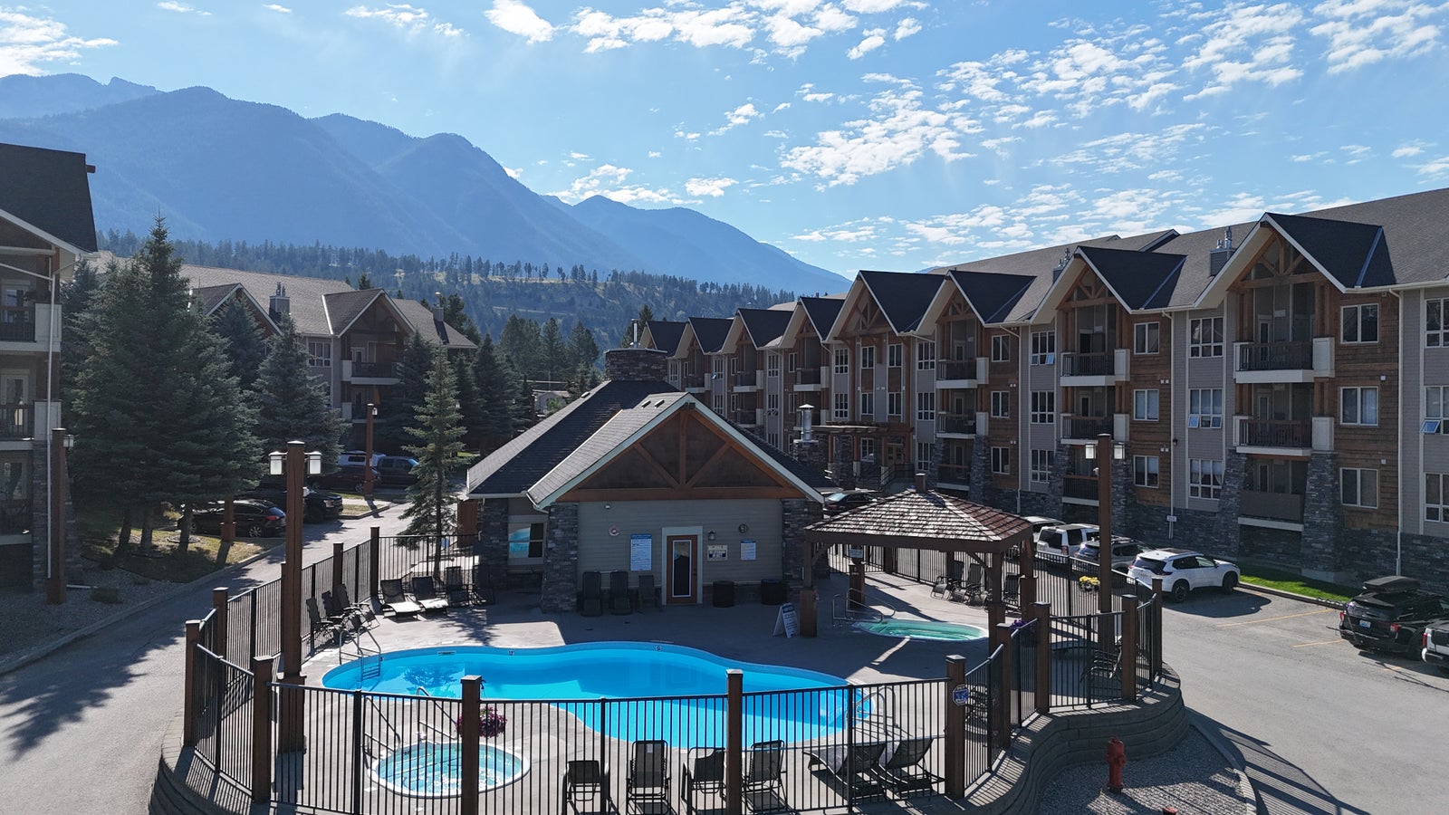 Outdoor pool and hot tub in the common area at Sable Ridge, Radium Hot Springs