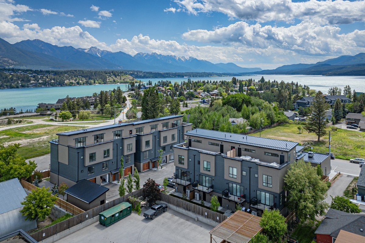Vista Heights development Aerial view of Vista Heights luxury townhomes in downtown Invermere BC with Lake Windermere and Rocky Mountains