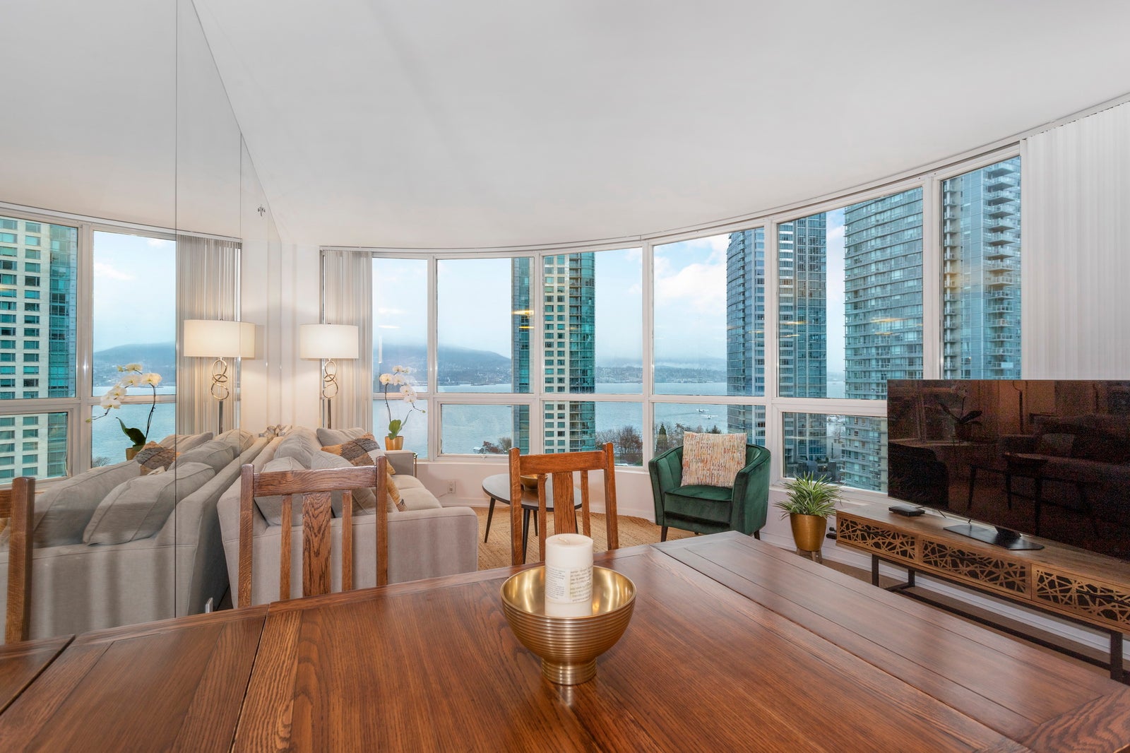 Downtown Vancouver condo with floor-to-ceiling windows and ocean views managed by a Vancouver property management company