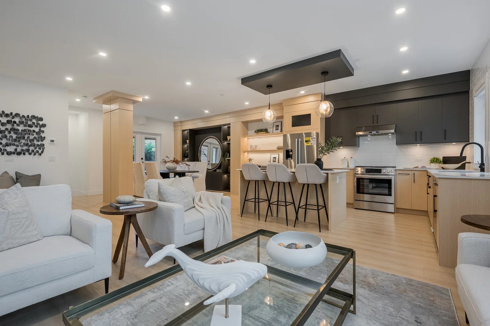 Furnished open-concept living room and kitchen in a Metro Vancouver rental property