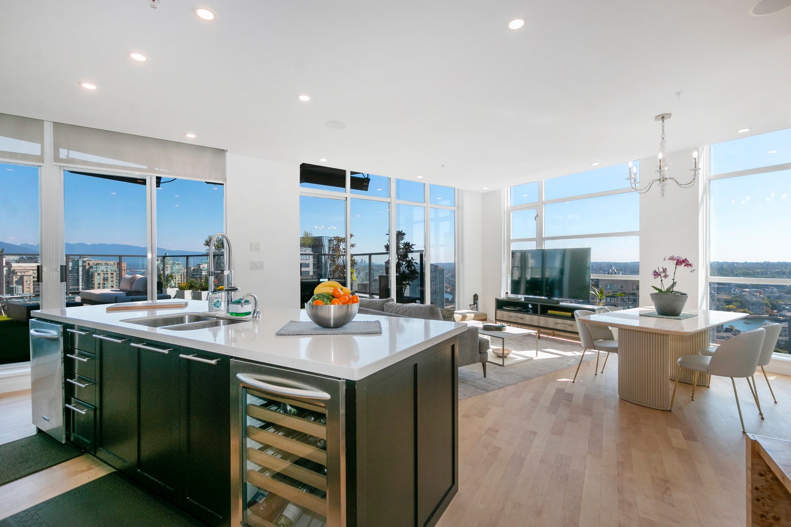 Modern furnished condo rental in Vancouver with open kitchen and living room