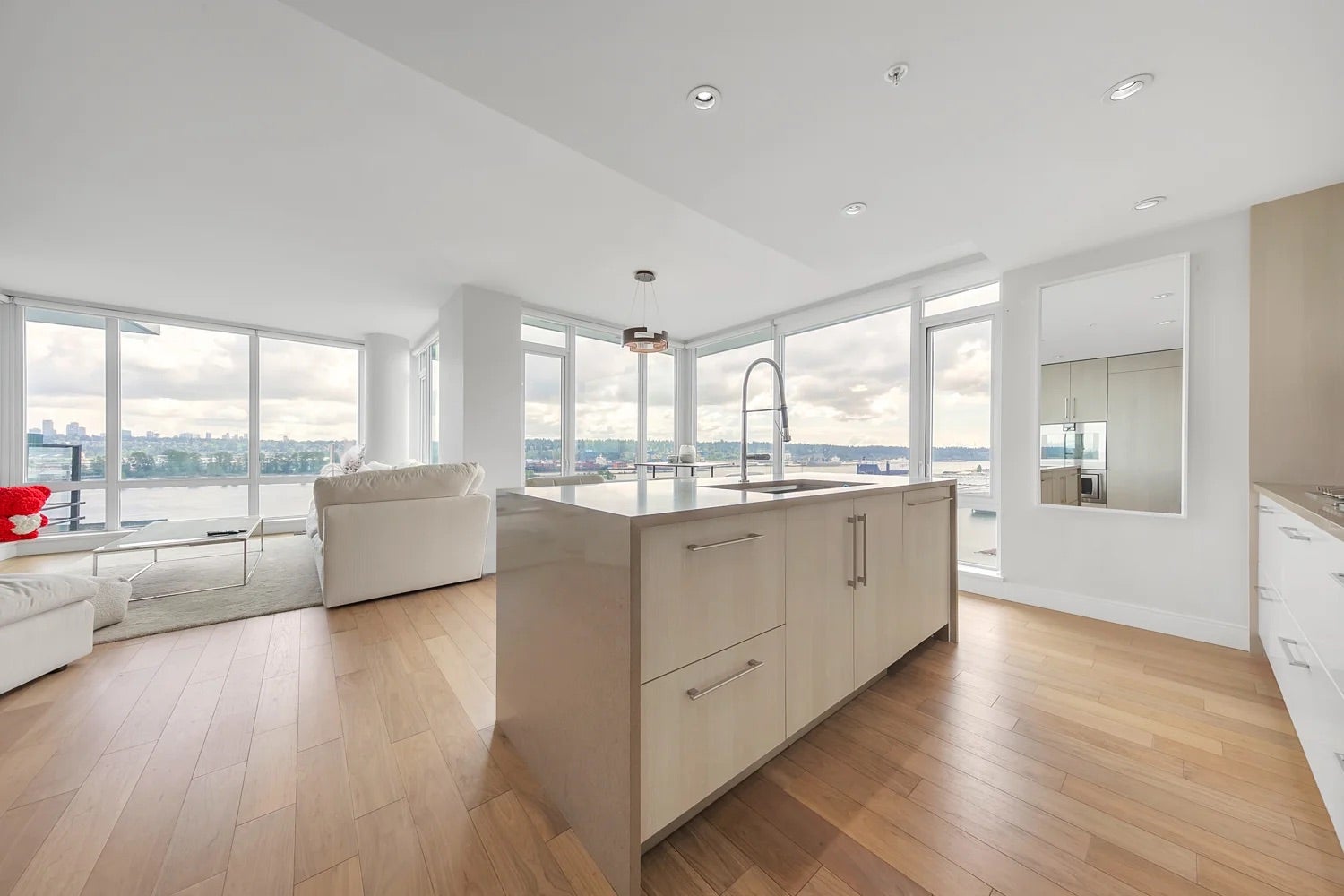 Modern kitchen and open living area in a Langley rental property with panoramic views