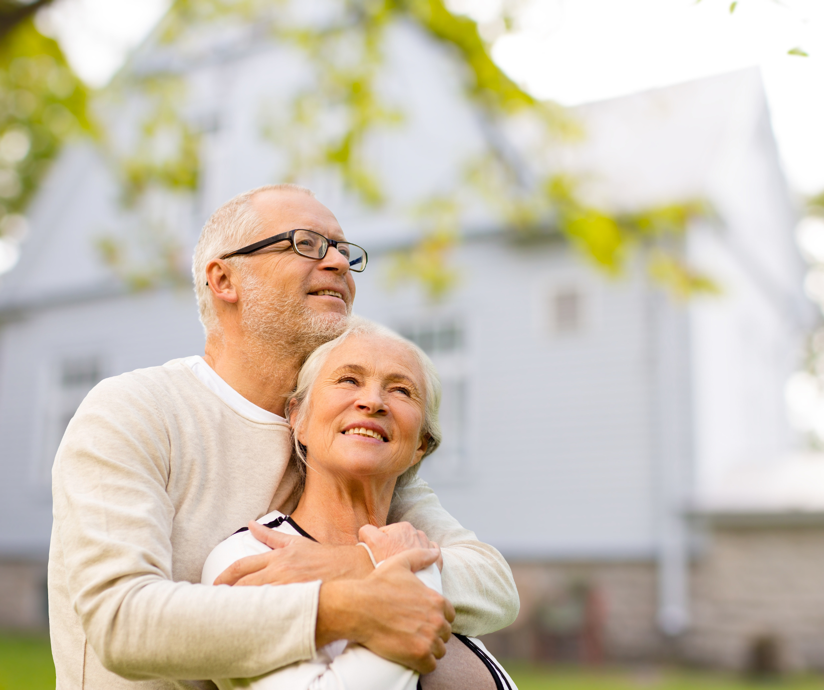 senior couple looking at homes